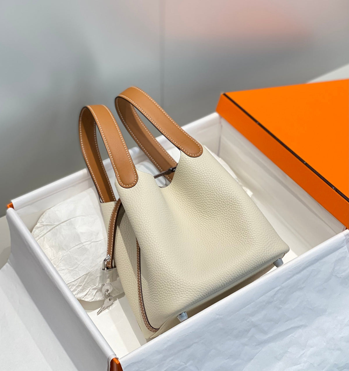 Hermes 25S Picotin Lock 18 in Burnt Orange and Ivory Calfskin Silver Hardware Bag