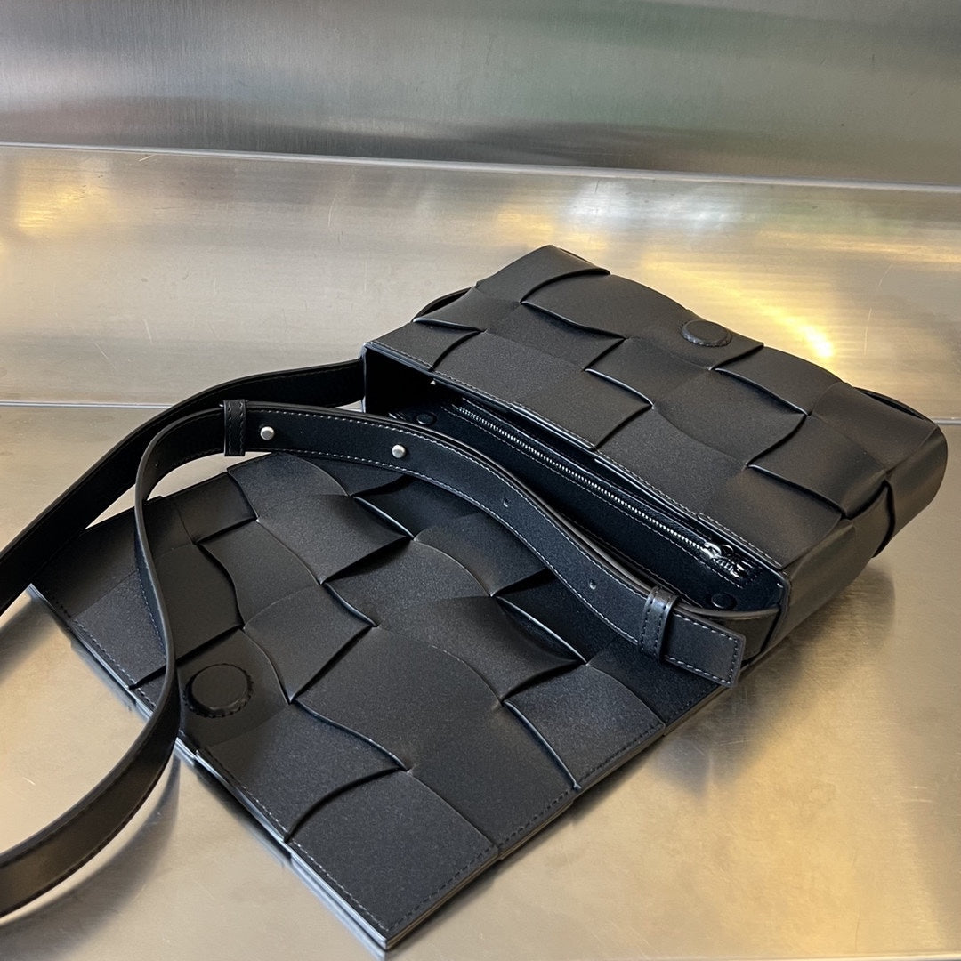 Bottega Veneta Cassette 23 in Black Calfskin with Wavy Pattern Bag