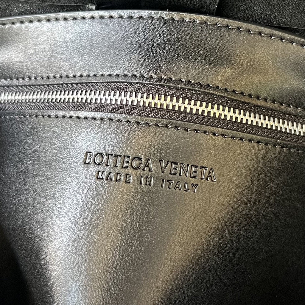 Bottega Veneta Cassette 23 in Black Calfskin with Wavy Pattern Bag