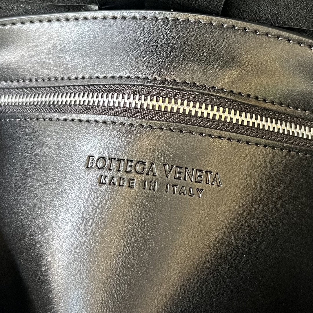 Bottega Veneta Cassette 23 in Black Calfskin with Wavy Pattern Bag