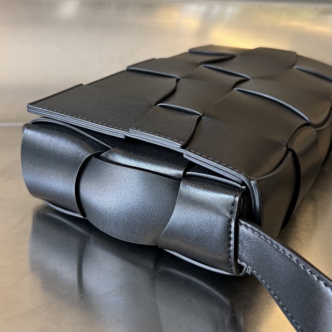 Bottega Veneta Cassette 23 in Black Calfskin with Wavy Pattern Bag