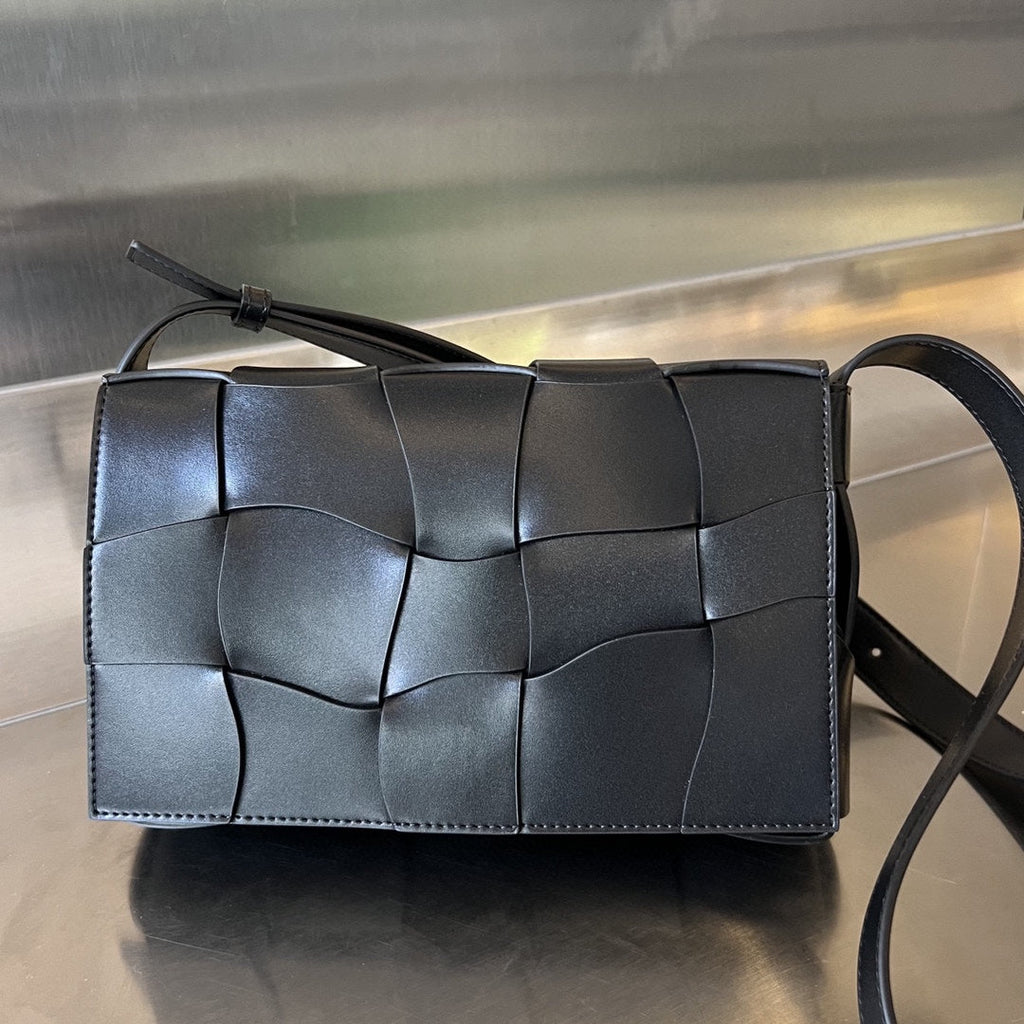 Bottega Veneta Cassette 23 in Black Calfskin with Wavy Pattern Bag