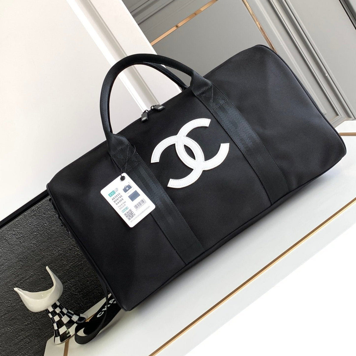 Chanel Travel Bag 45 in Black Canvas with White Logo