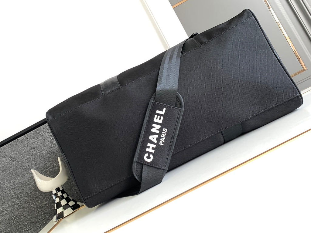 Chanel Travel Bag 45 in Black Canvas with White Logo