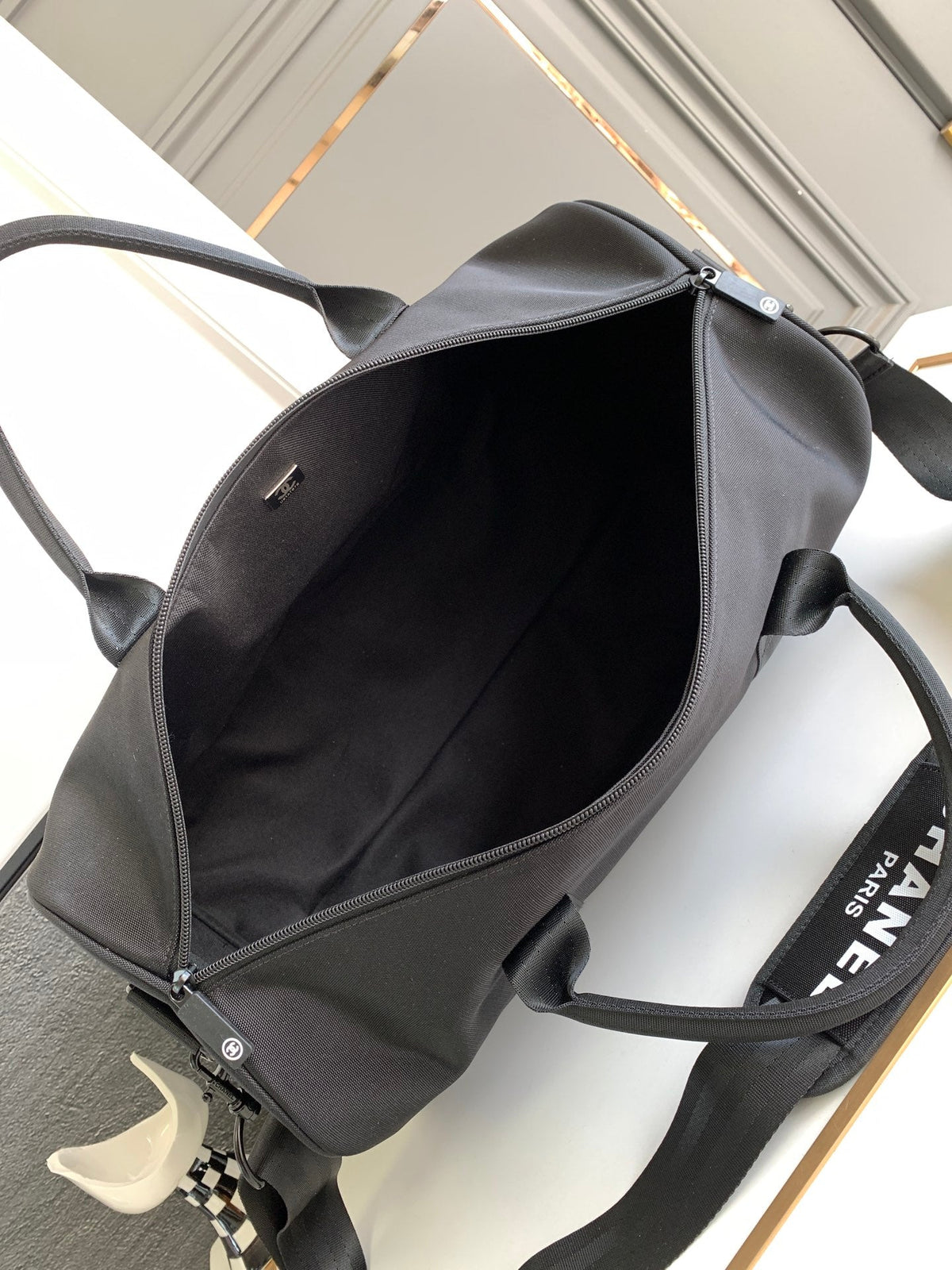 Chanel Travel Bag 45 in Black Canvas with White Logo
