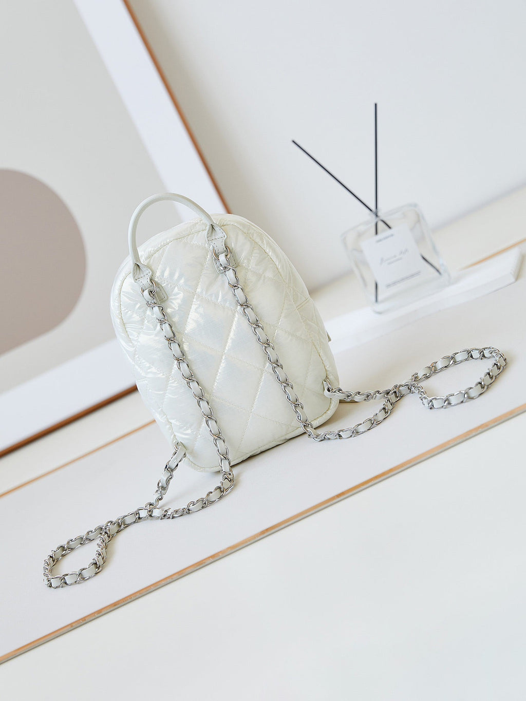 Chanel Backpack 22 in White Fabric Silver Hardware