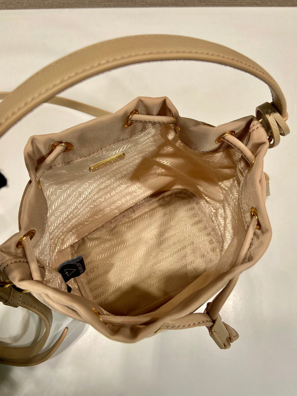 Prada Bucket Bag 19 in Beige Re-Nylon and Saffiano Leather Handle