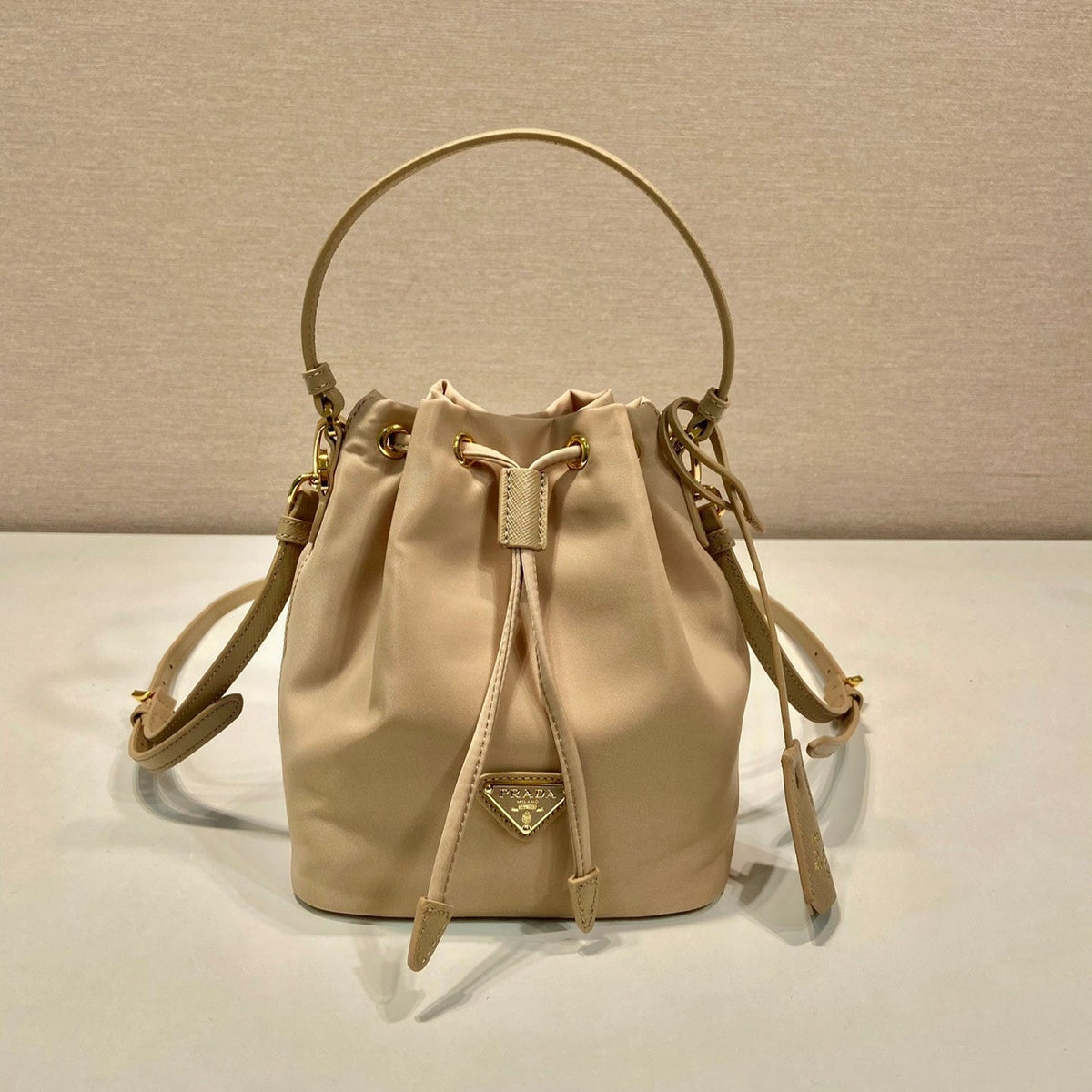 Prada Bucket Bag 19 in Beige Re-Nylon and Saffiano Leather Handle