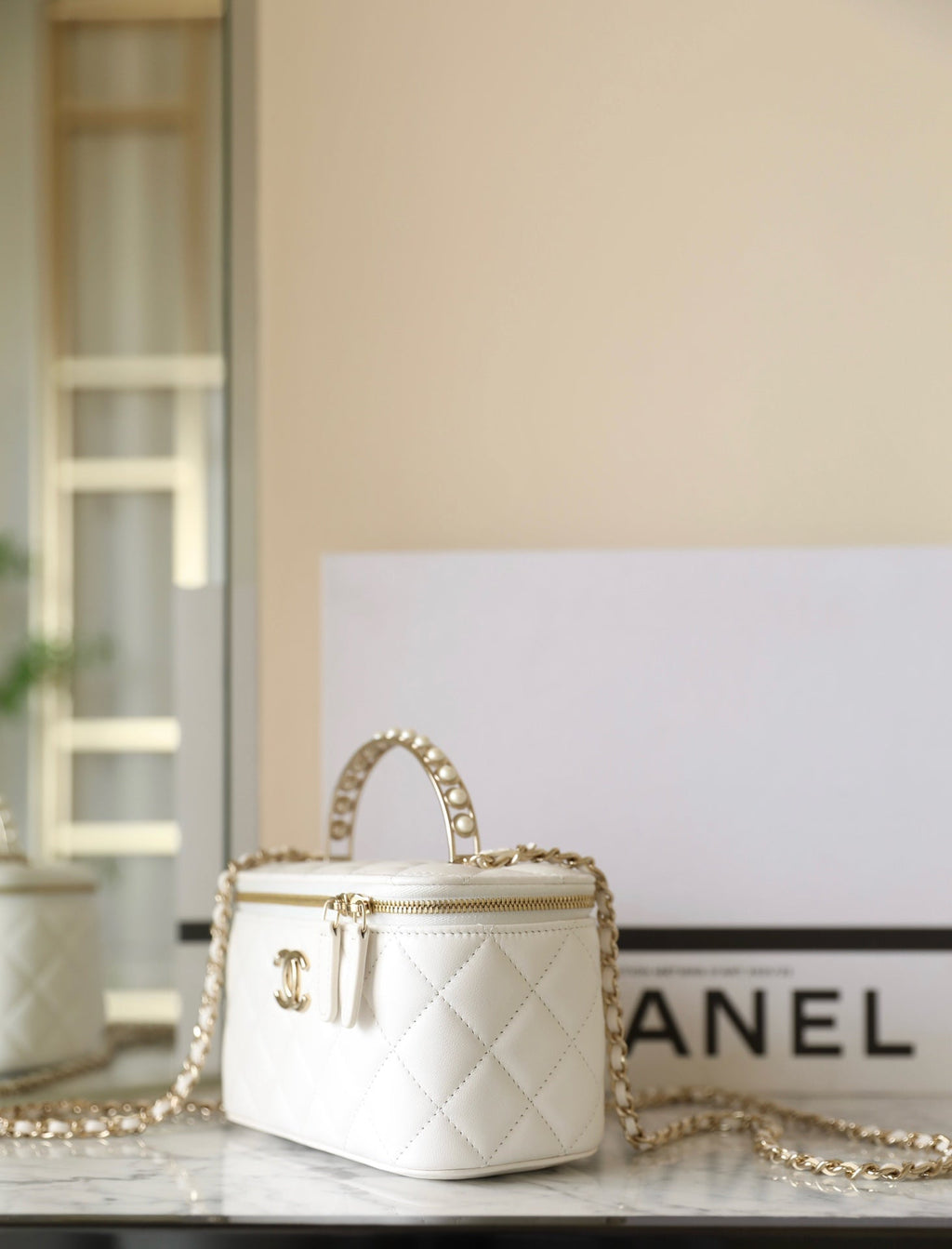 Chanel 25S Vanity Bag 17 cm in White Lambskin with Pearl Strap