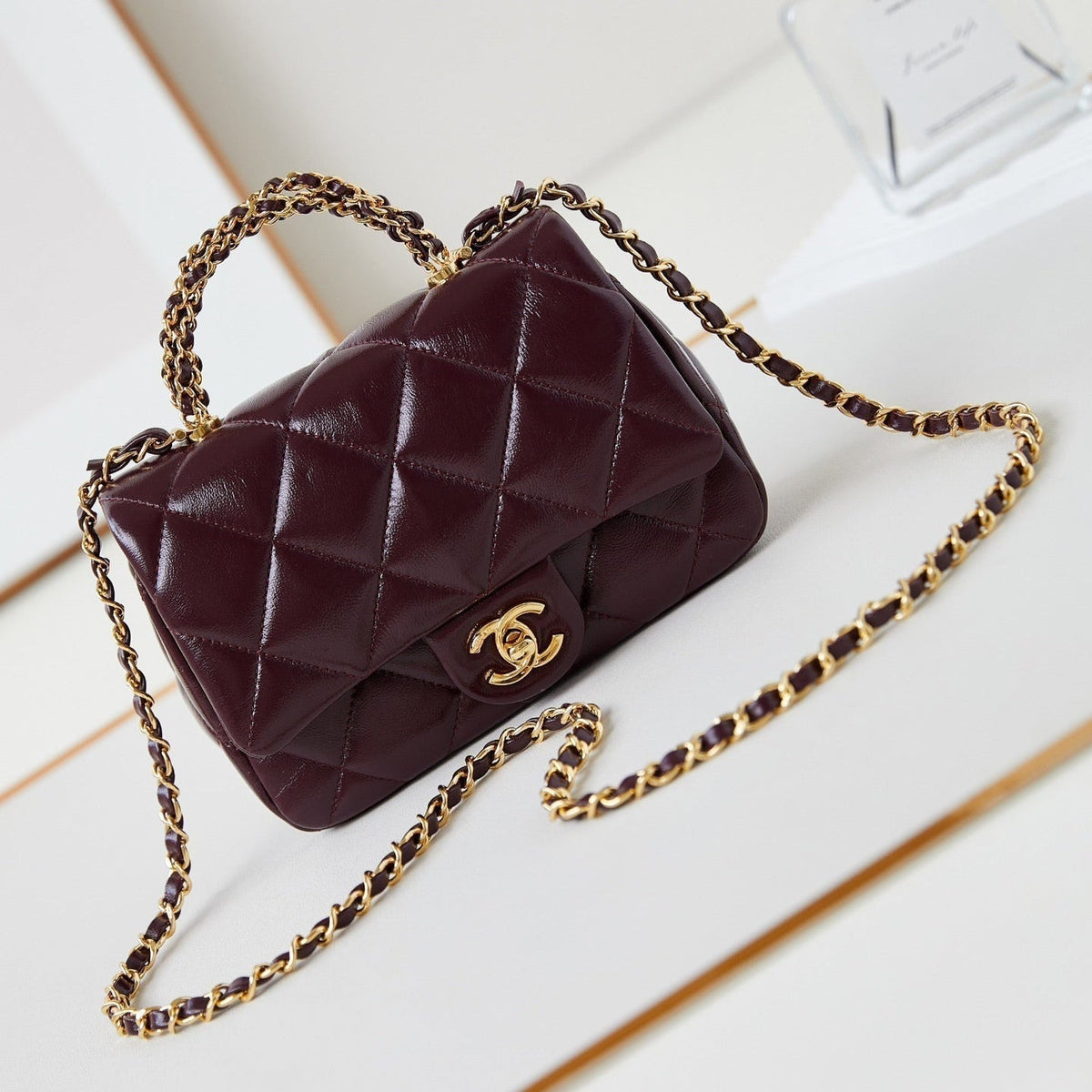 Chanel Flap Bag with Top Handle 18 in Wine Red Oil-Wax Lambskin Gold Hardware