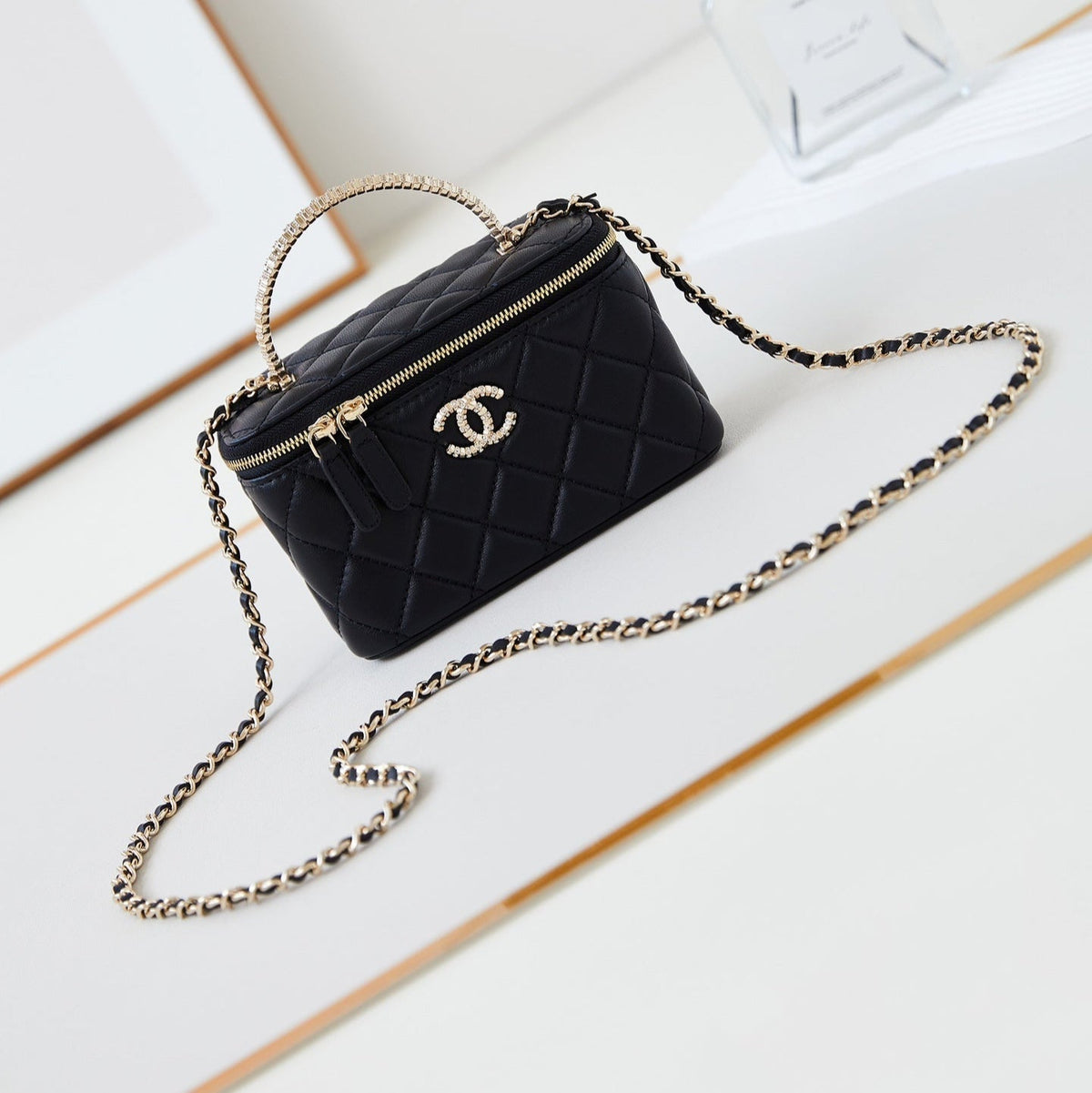 Chanel 25S Mini Vanity Bag 16 cm in Black Lambskin with Crystal-Embellished Logo