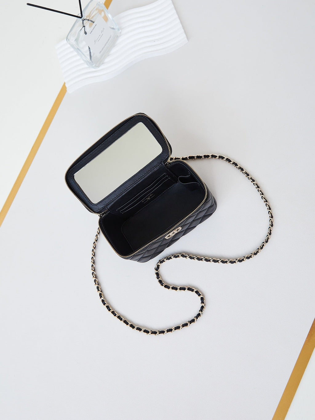 Chanel 25S Mini Vanity Bag 16 cm in Black Lambskin with Crystal-Embellished Logo
