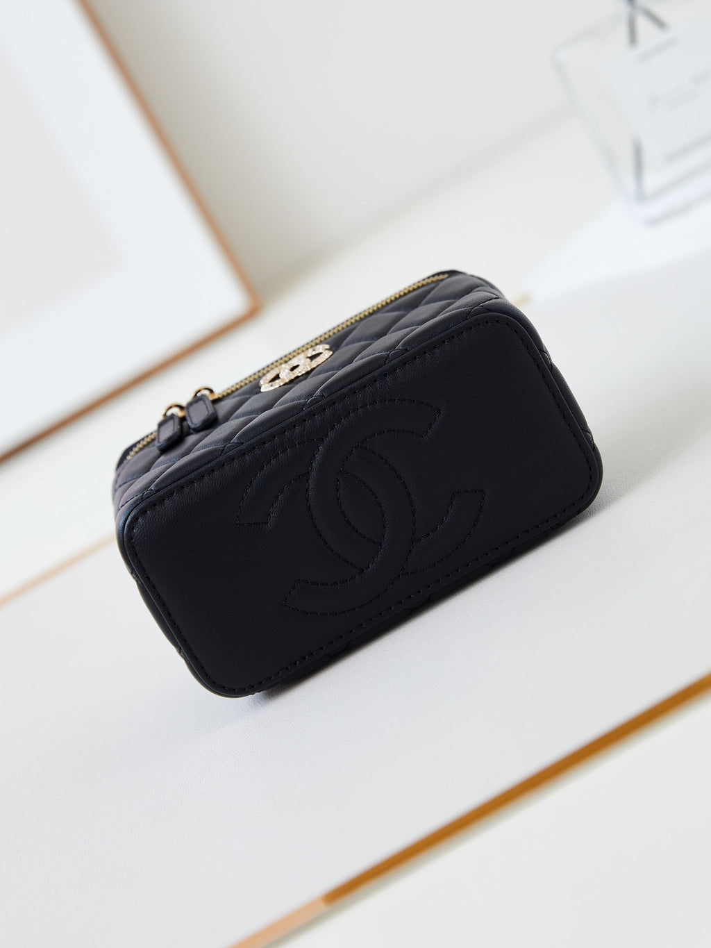 Chanel 25S Mini Vanity Bag 16 cm in Black Lambskin with Crystal-Embellished Logo