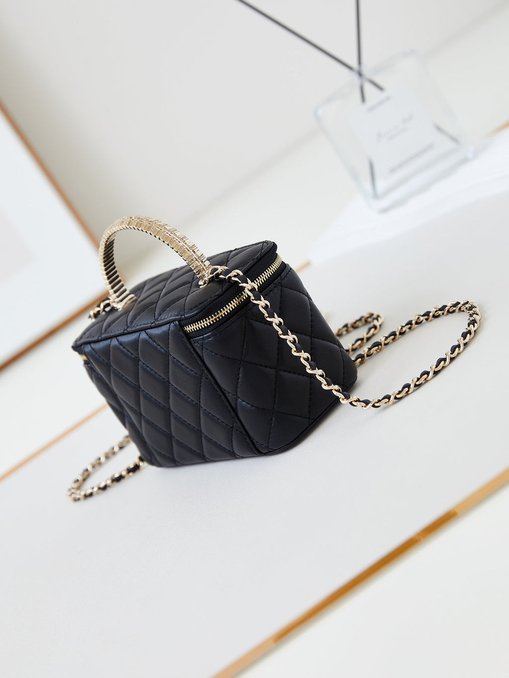Chanel 25S Mini Vanity Bag 16 cm in Black Lambskin with Crystal-Embellished Logo