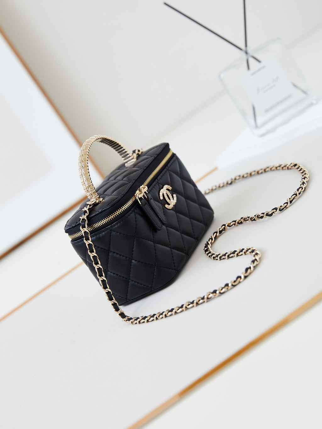 Chanel 25S Mini Vanity Bag 16 cm in Black Lambskin with Crystal-Embellished Logo