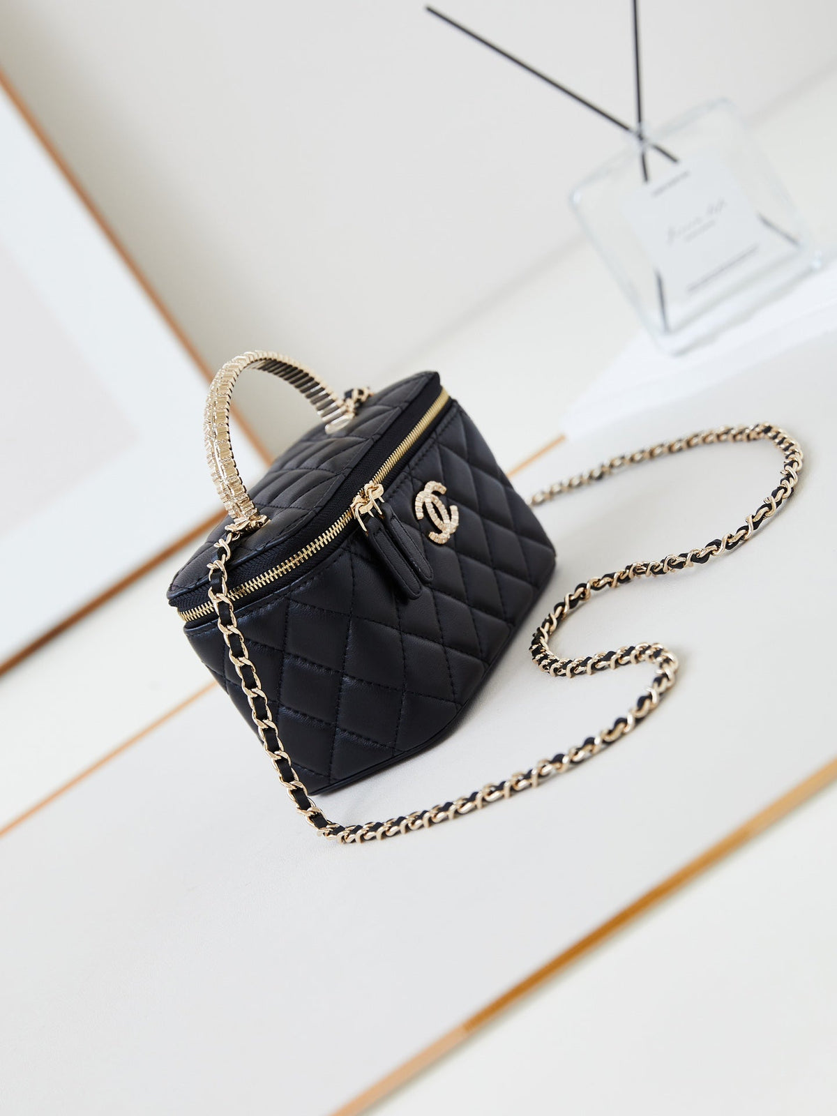 Chanel 25S Mini Vanity Bag 16 cm in Black Lambskin with Crystal-Embellished Logo