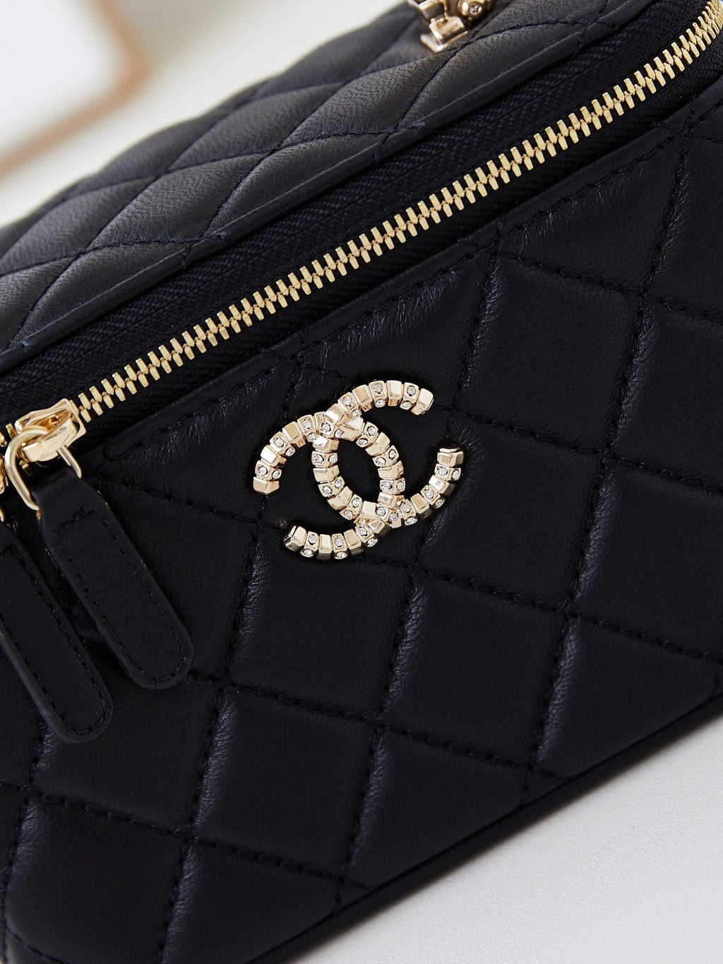 Chanel 25S Mini Vanity Bag 16 cm in Black Lambskin with Crystal-Embellished Logo