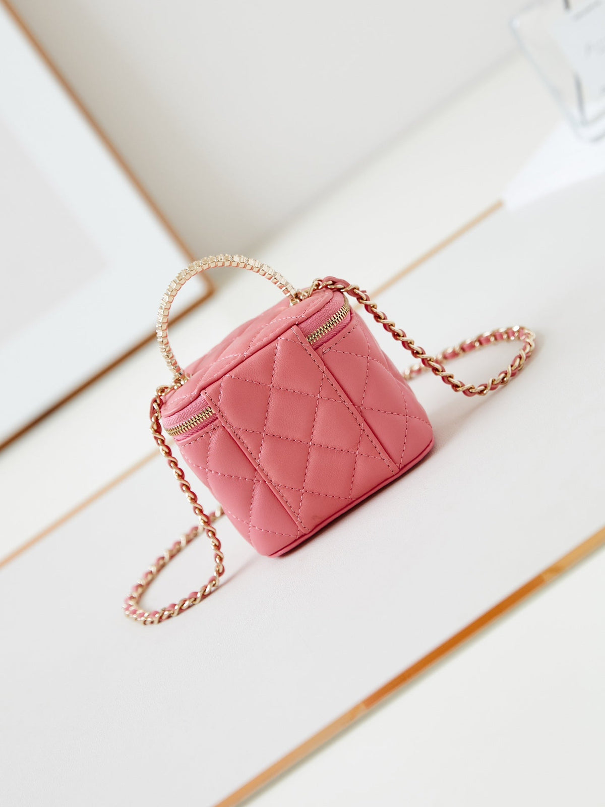 Chanel 25S Mini Vanity Bag 11 cm in Peach Pink Lambskin with Crystal-Embellished Logo
