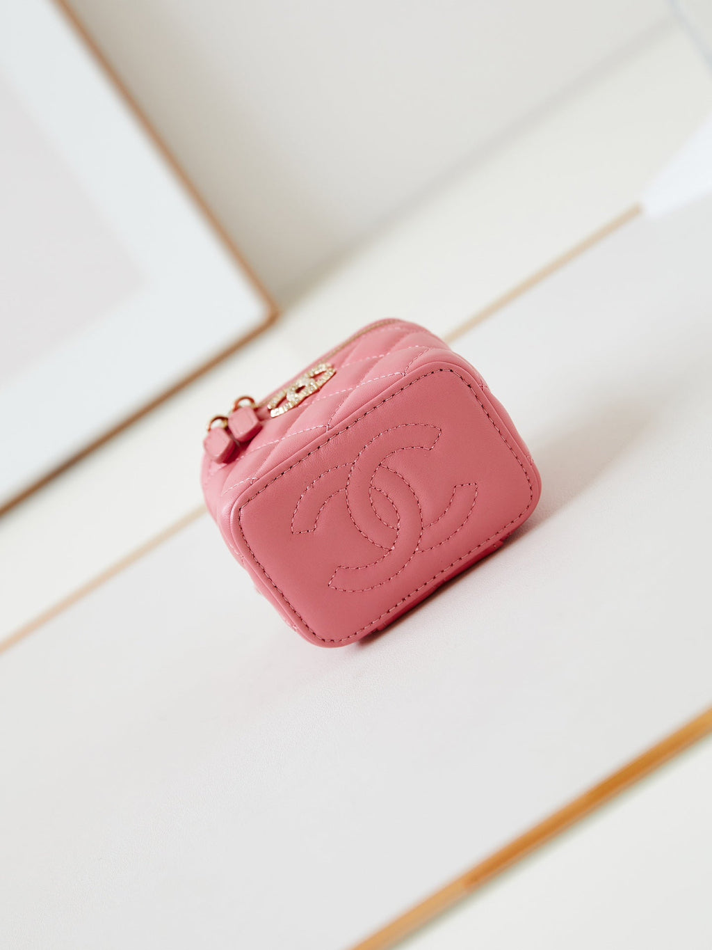 Chanel 25S Mini Vanity Bag 11 cm in Peach Pink Lambskin with Crystal-Embellished Logo