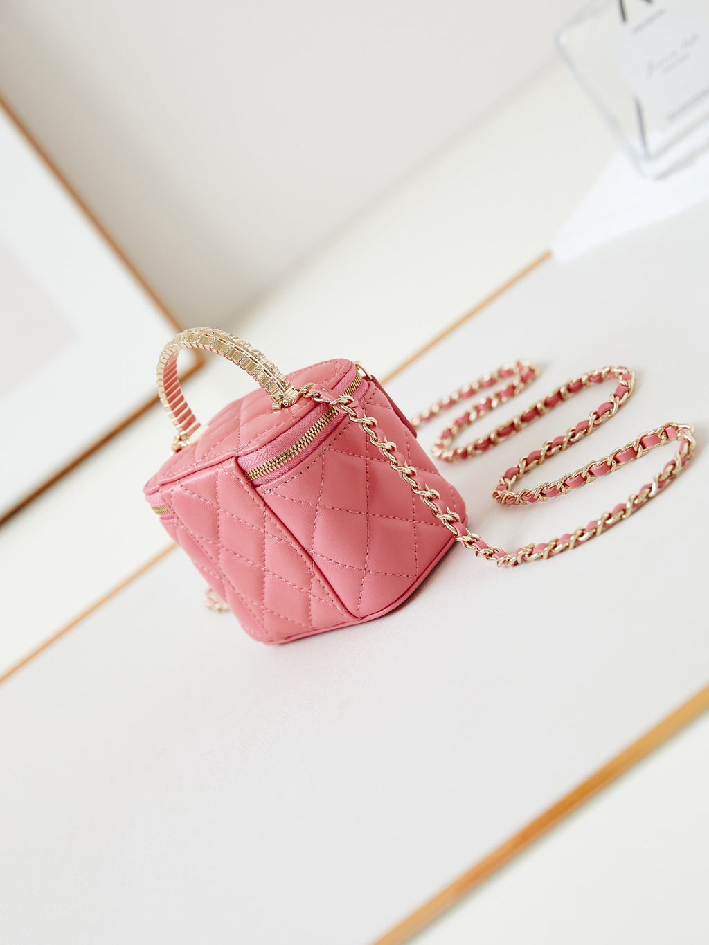 Chanel 25S Mini Vanity Bag 11 cm in Peach Pink Lambskin with Crystal-Embellished Logo