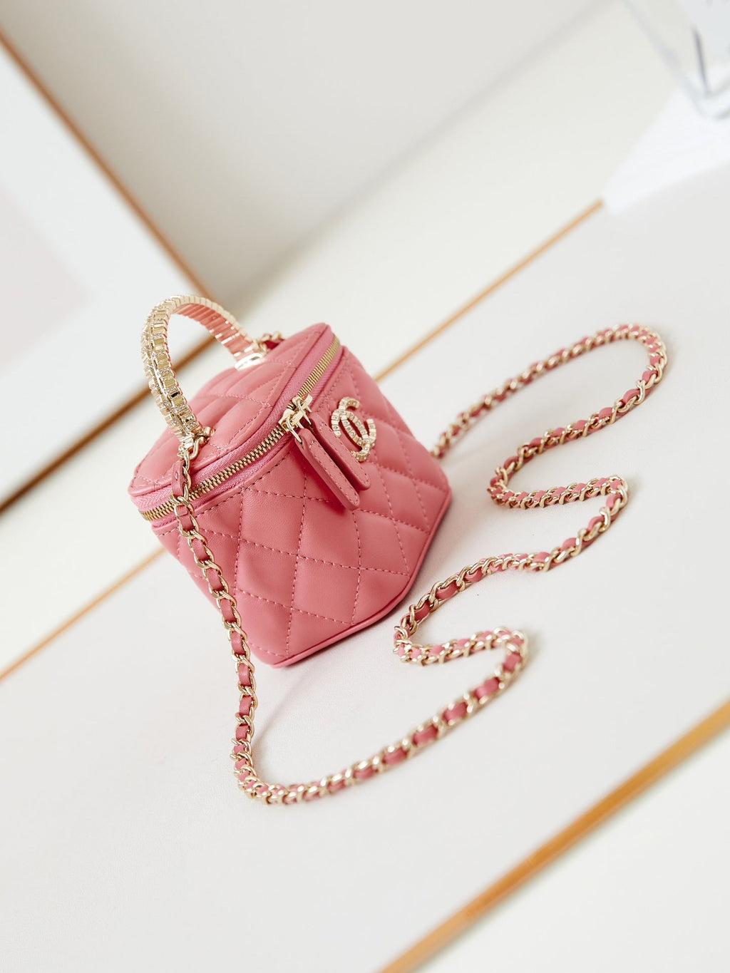 Chanel 25S Mini Vanity Bag 11 cm in Peach Pink Lambskin with Crystal-Embellished Logo