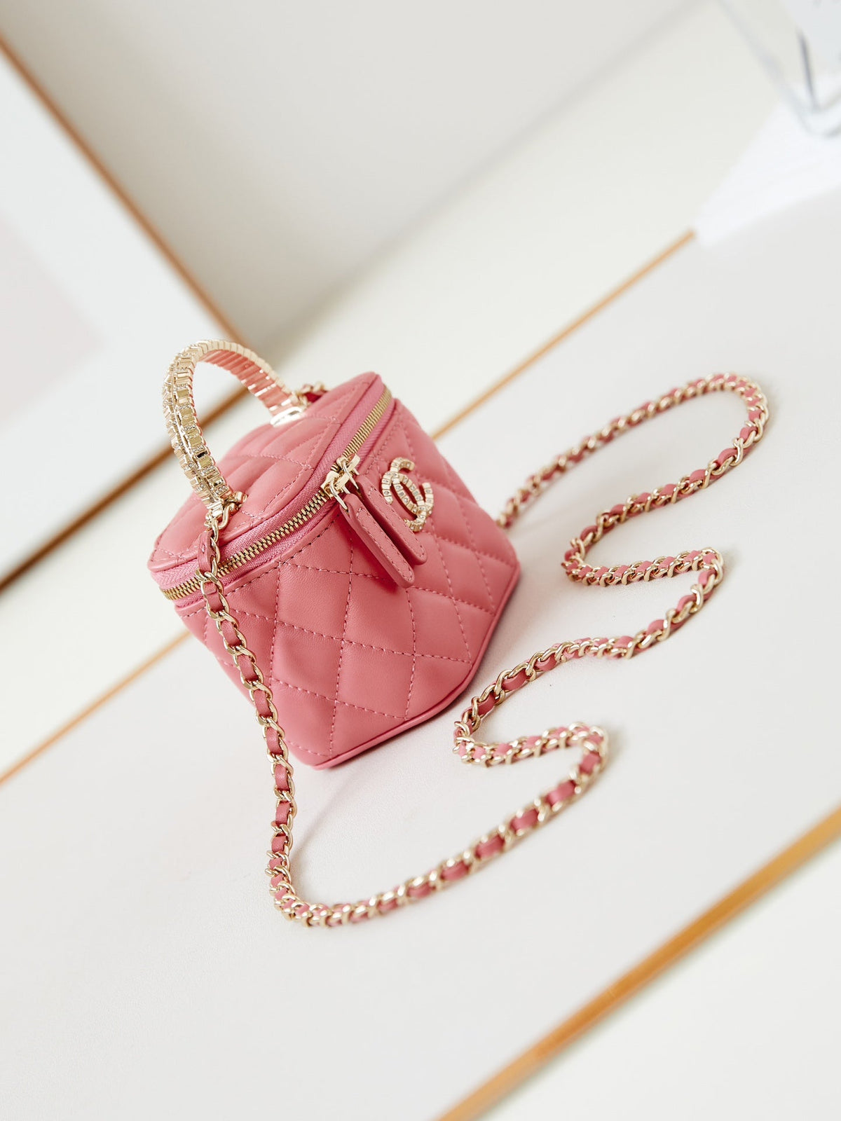 Chanel 25S Mini Vanity Bag 11 cm in Peach Pink Lambskin with Crystal-Embellished Logo