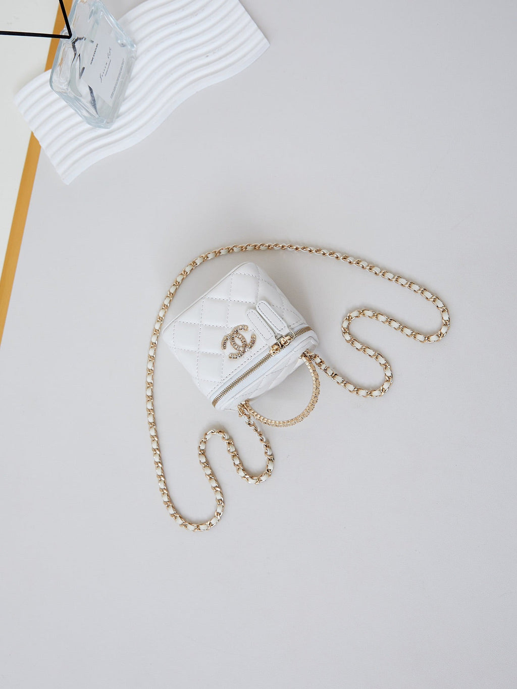 Chanel 25S Mini Vanity Bag 11 cm in White Lambskin with Crystal-Embellished Logo