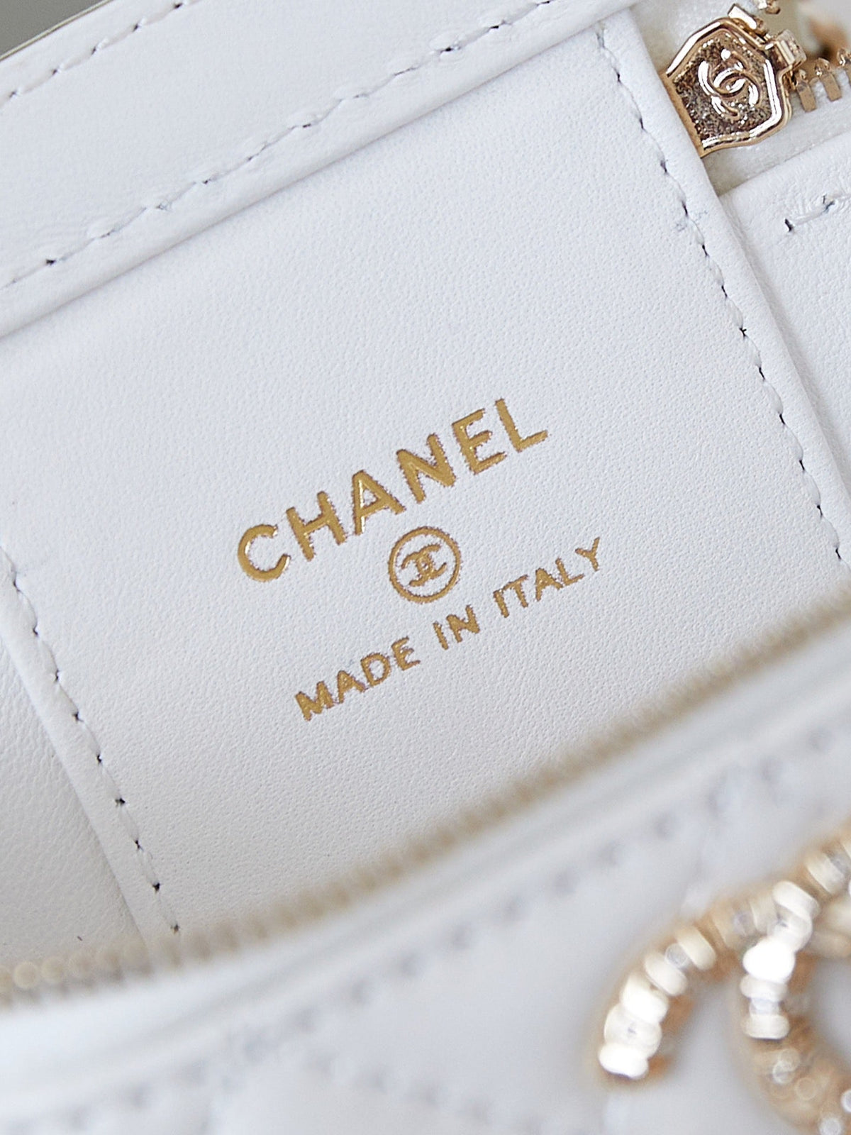 Chanel 25S Mini Vanity Bag 11 cm in White Lambskin with Crystal-Embellished Logo