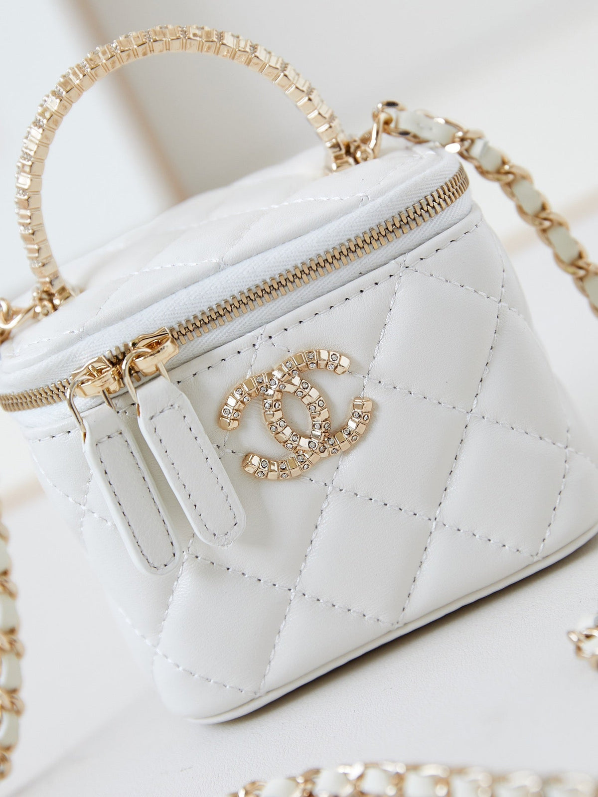 Chanel 25S Mini Vanity Bag 11 cm in White Lambskin with Crystal-Embellished Logo