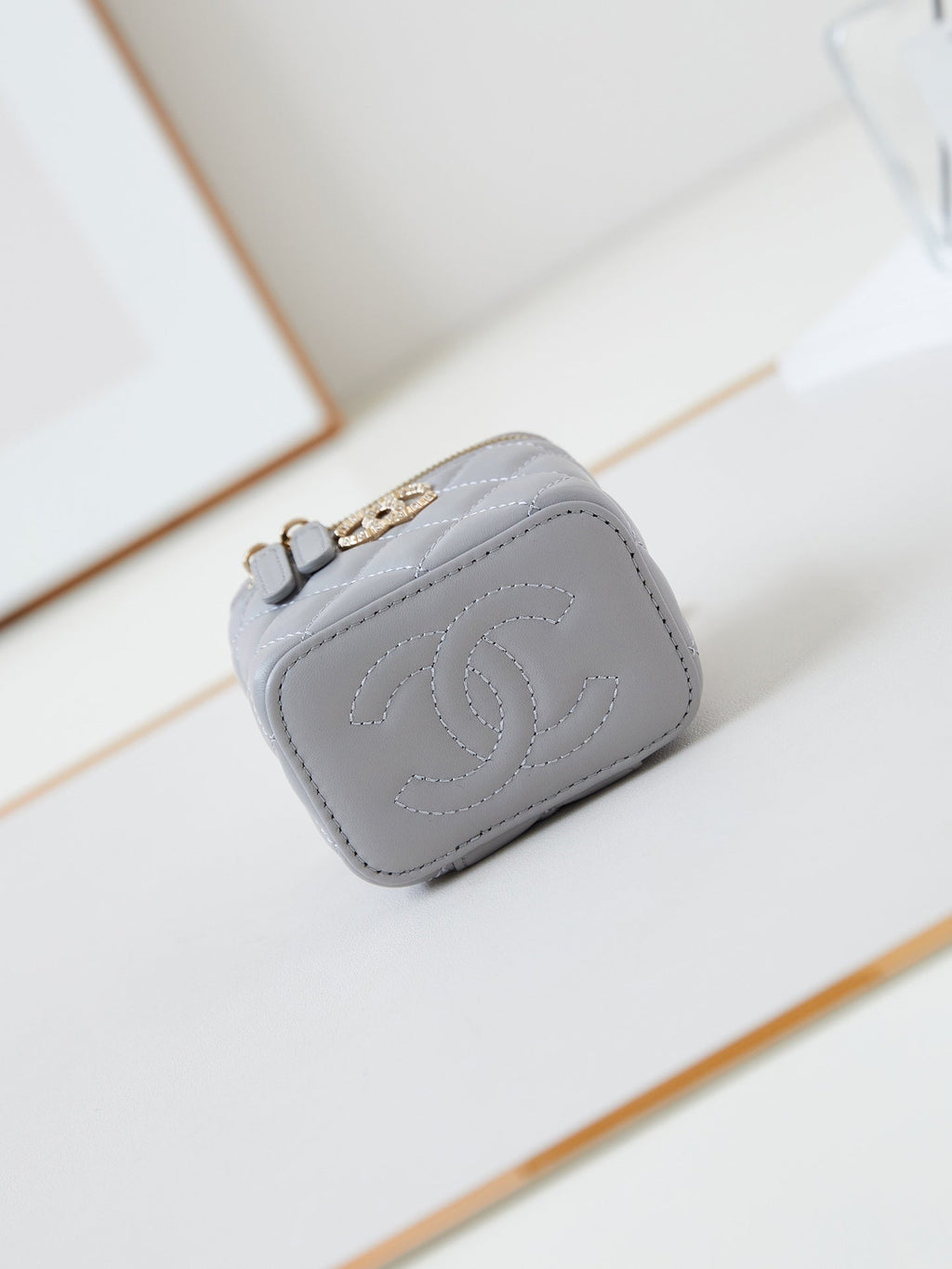 Chanel 25S Mini Vanity Bag 11 cm in Grey Lambskin with Crystal-Embellished Logo