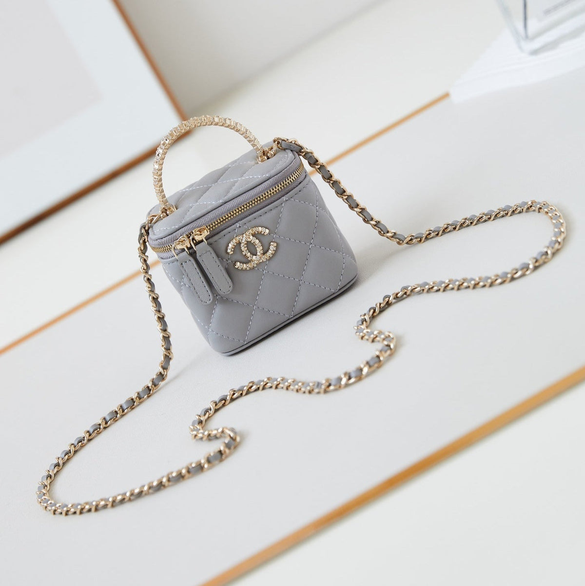 Chanel 25S Mini Vanity Bag 11 cm in Grey Lambskin with Crystal-Embellished Logo