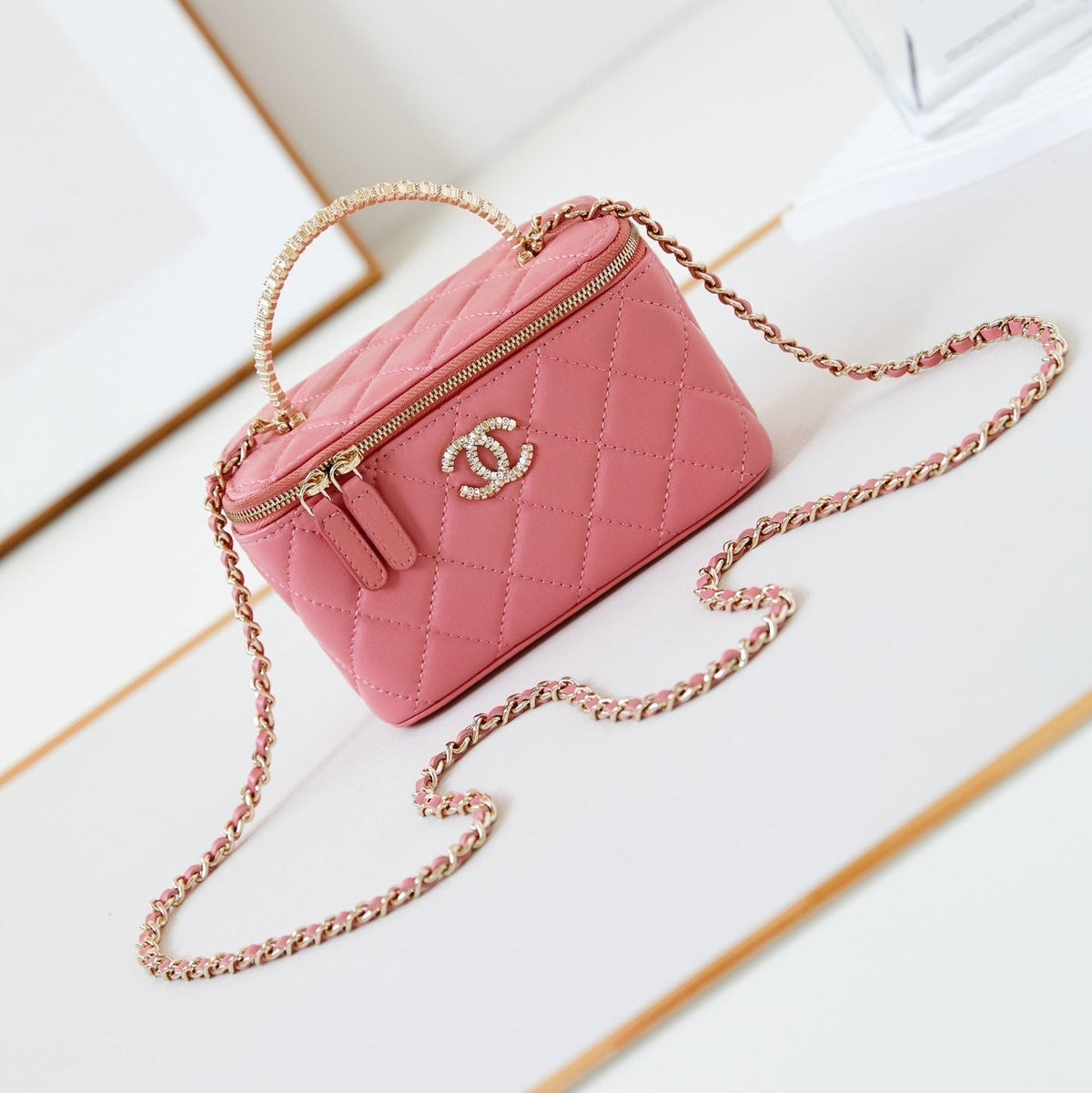 Chanel 25S Mini Vanity Bag 16 cm in Peachy Pink Lambskin with Crystal-Embellished Logo