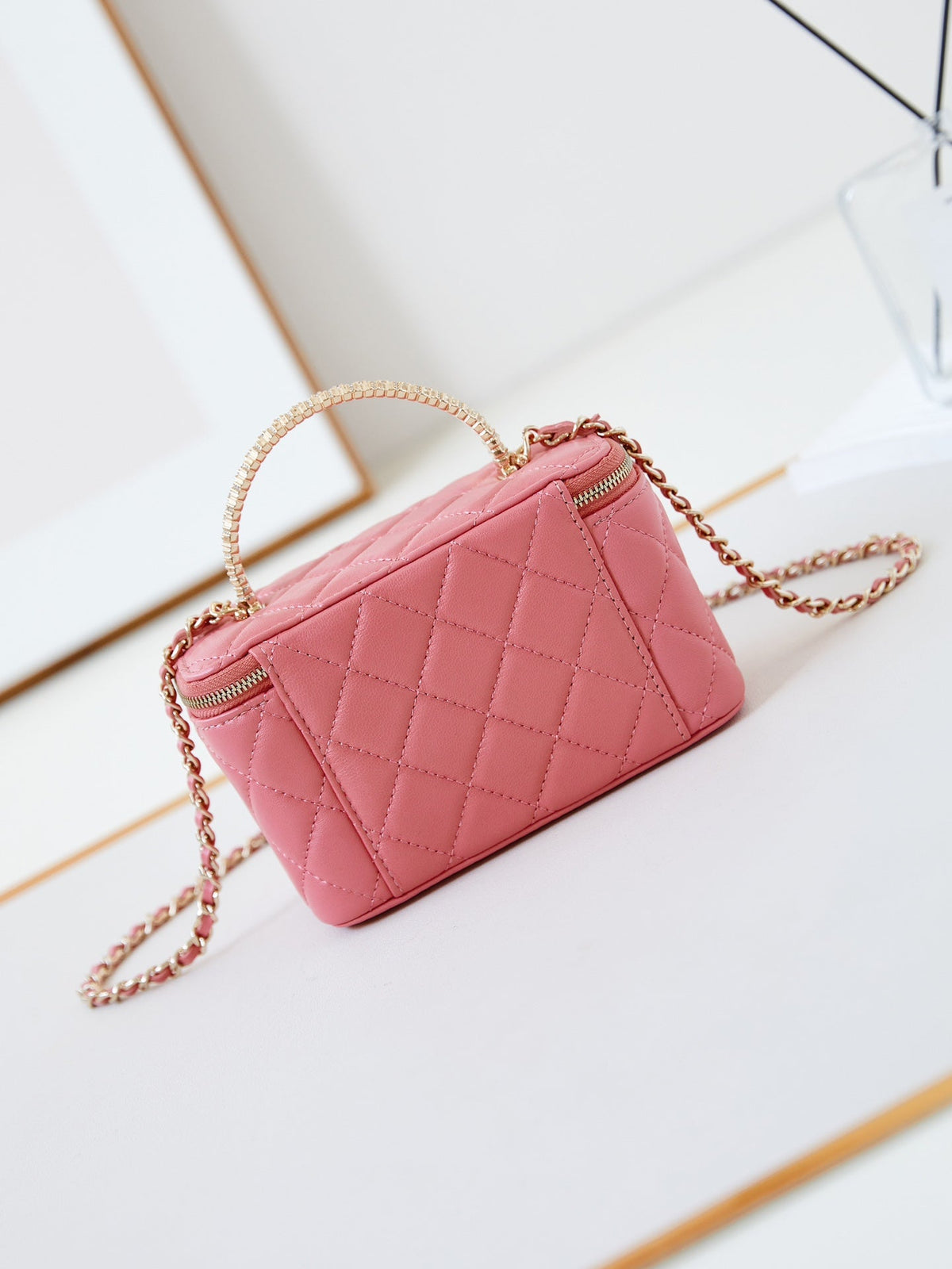 Chanel 25S Mini Vanity Bag 16 cm in Peachy Pink Lambskin with Crystal-Embellished Logo