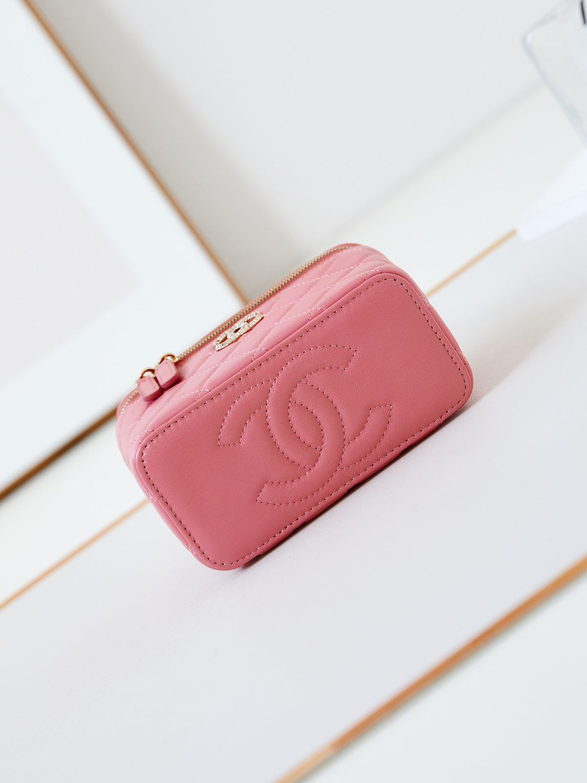 Chanel 25S Mini Vanity Bag 16 cm in Peachy Pink Lambskin with Crystal-Embellished Logo