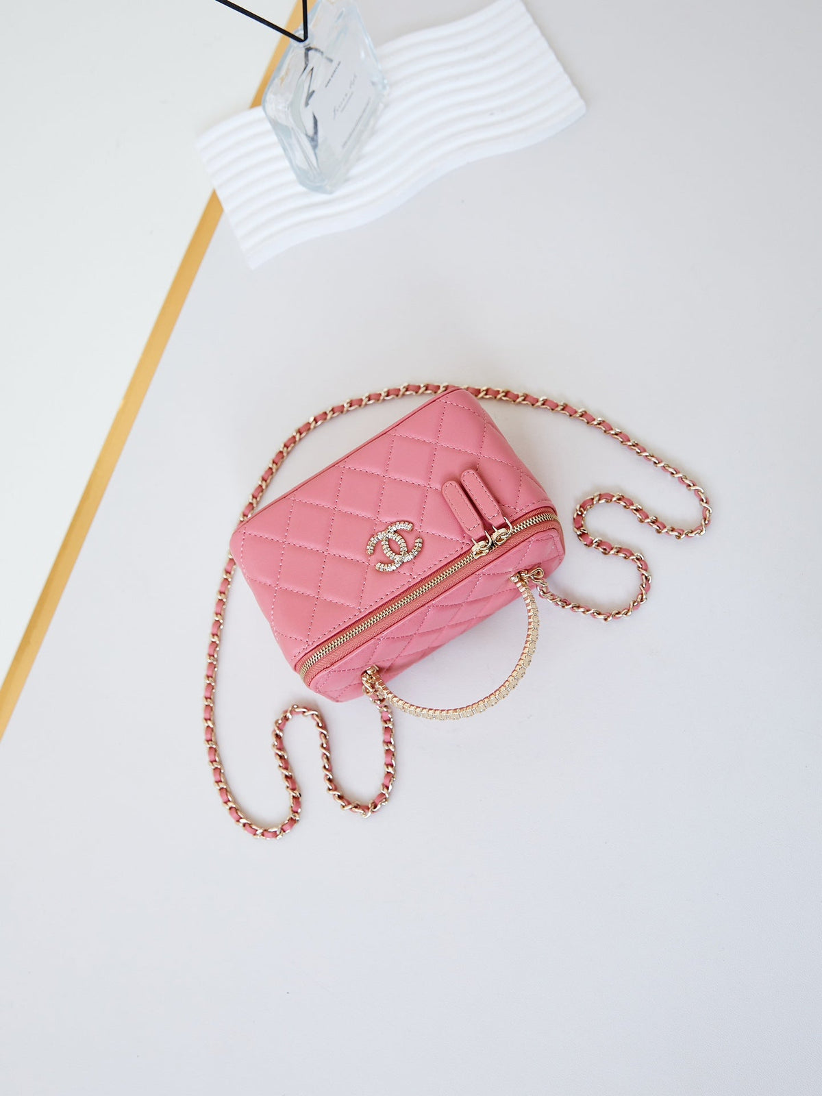 Chanel 25S Mini Vanity Bag 16 cm in Peachy Pink Lambskin with Crystal-Embellished Logo