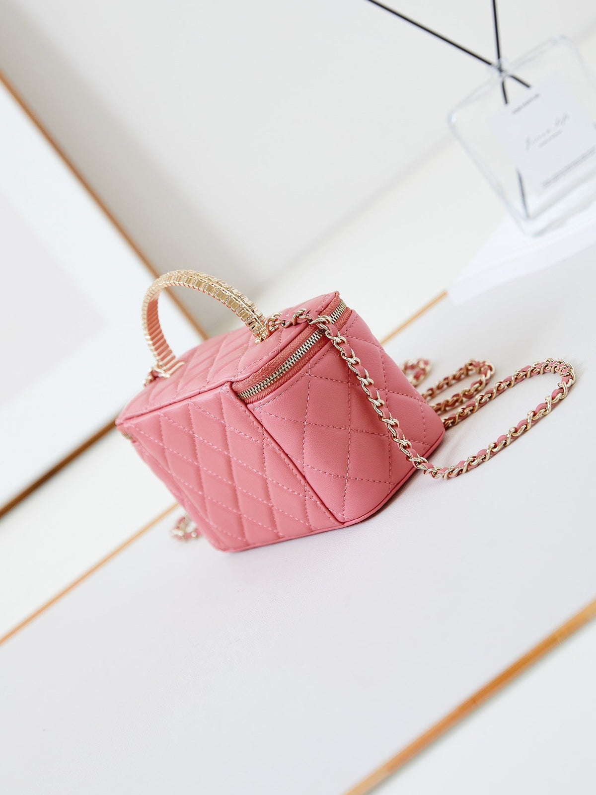 Chanel 25S Mini Vanity Bag 16 cm in Peachy Pink Lambskin with Crystal-Embellished Logo