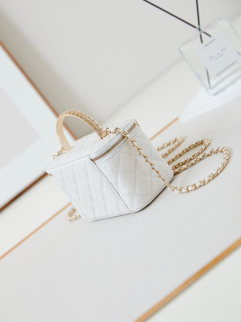 Chanel 25S Mini Vanity Bag 16 cm in White Lambskin with Crystal-Embellished Logo