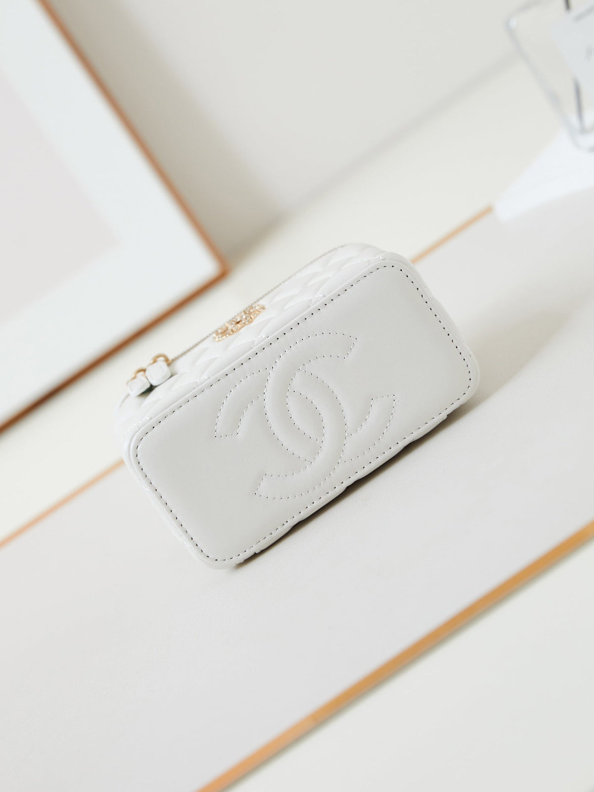 Chanel 25S Mini Vanity Bag 16 cm in White Lambskin with Crystal-Embellished Logo