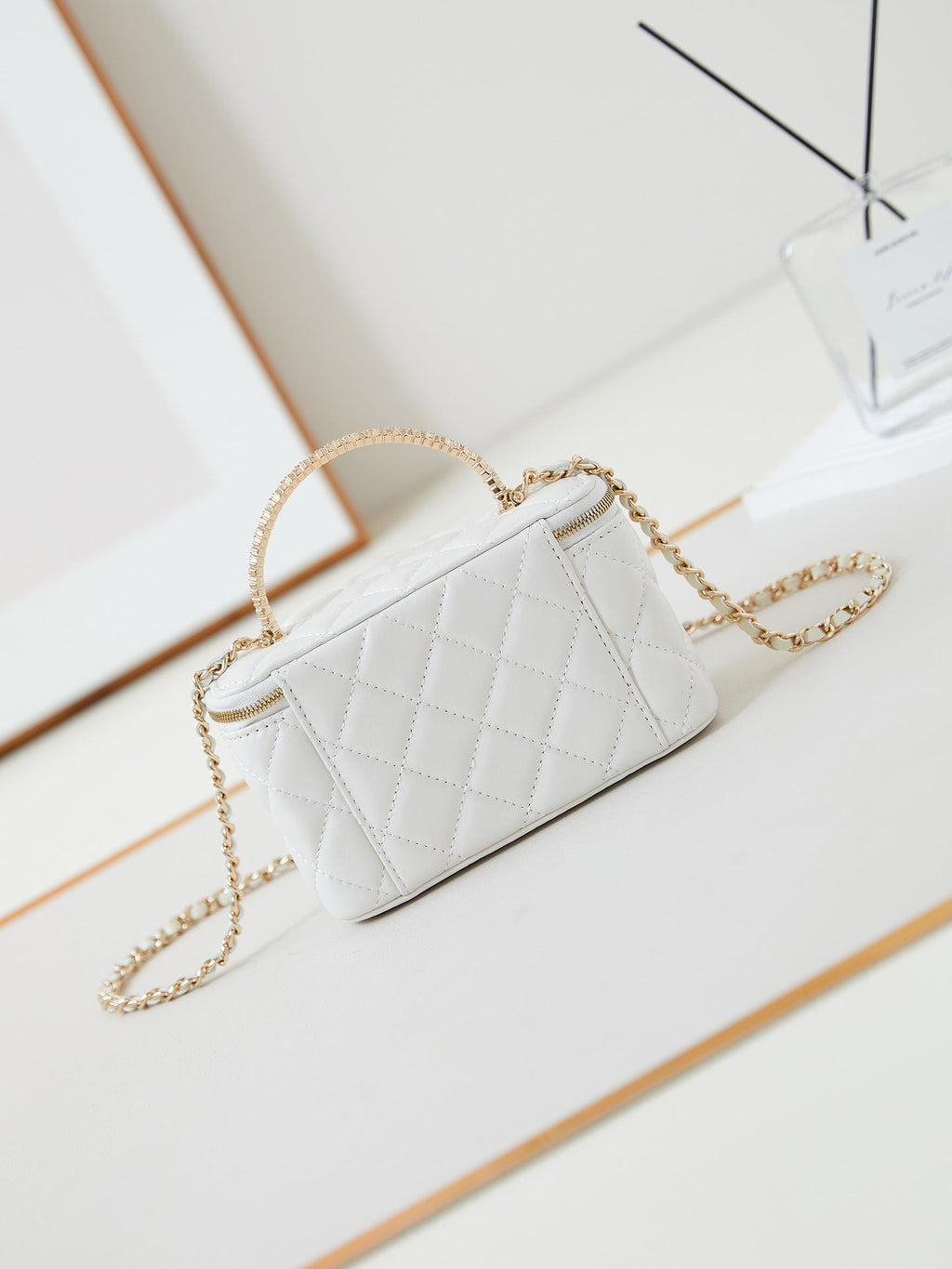 Chanel 25S Mini Vanity Bag 16 cm in White Lambskin with Crystal-Embellished Logo