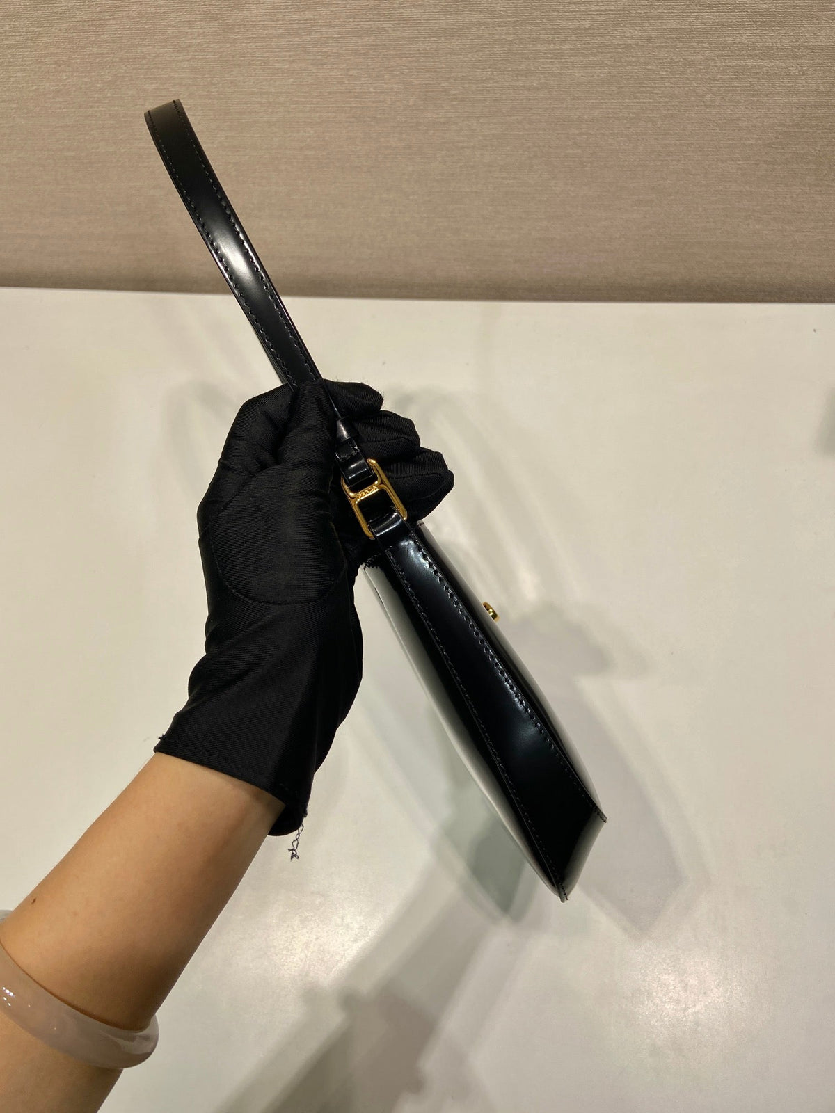 Prada Cleo Shoulder Bag 22 in Black Brushed Lambskin with Clasp Closure