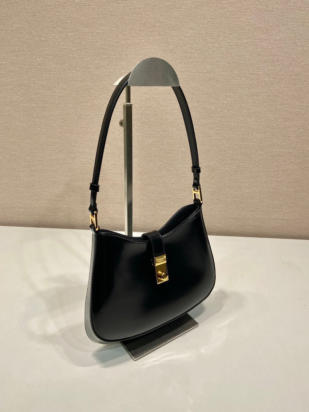 Prada Cleo Shoulder Bag 22 in Black Brushed Lambskin with Clasp Closure