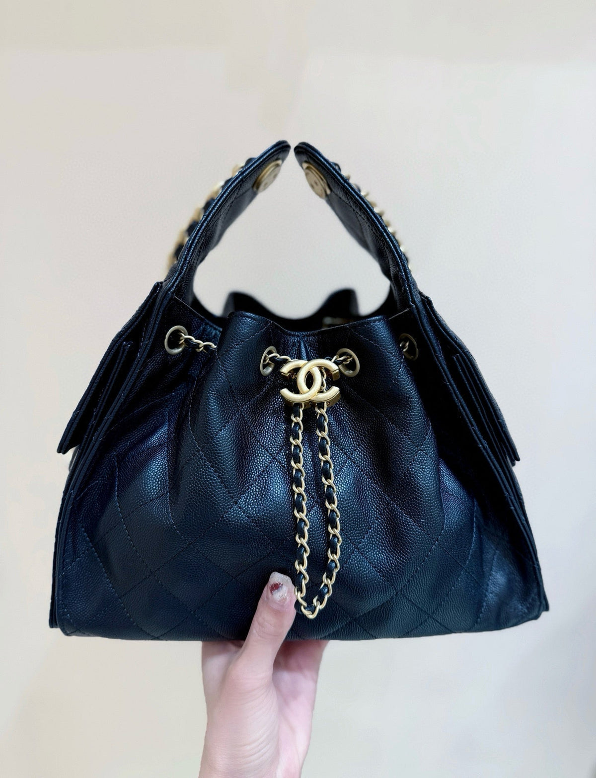 Chanel 25 Handbag in Black 30 Grained Calfskin Gold Hardware