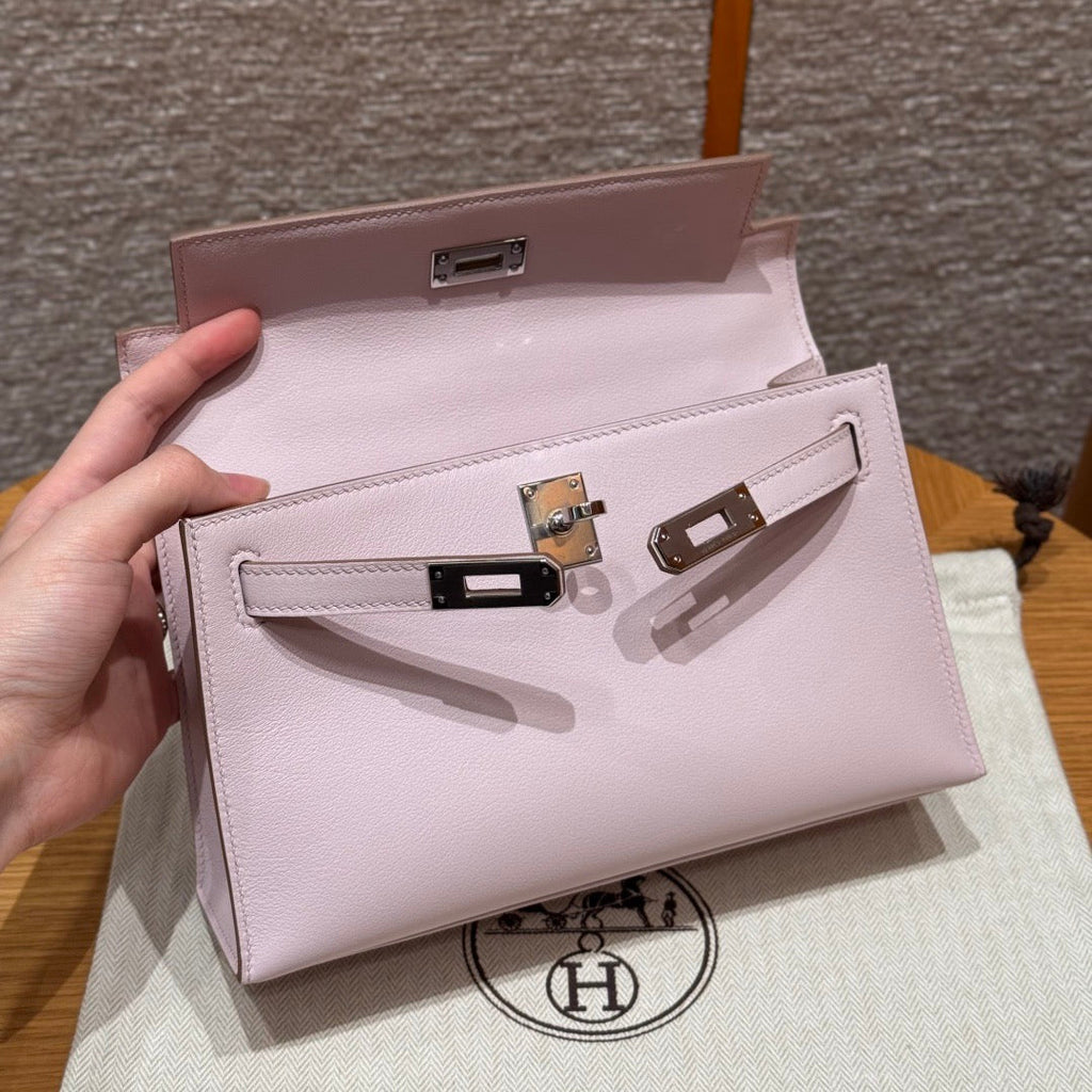 Hermes Kelly Pochette 22 in Light Pink Calfskin Silver Hardware Bag