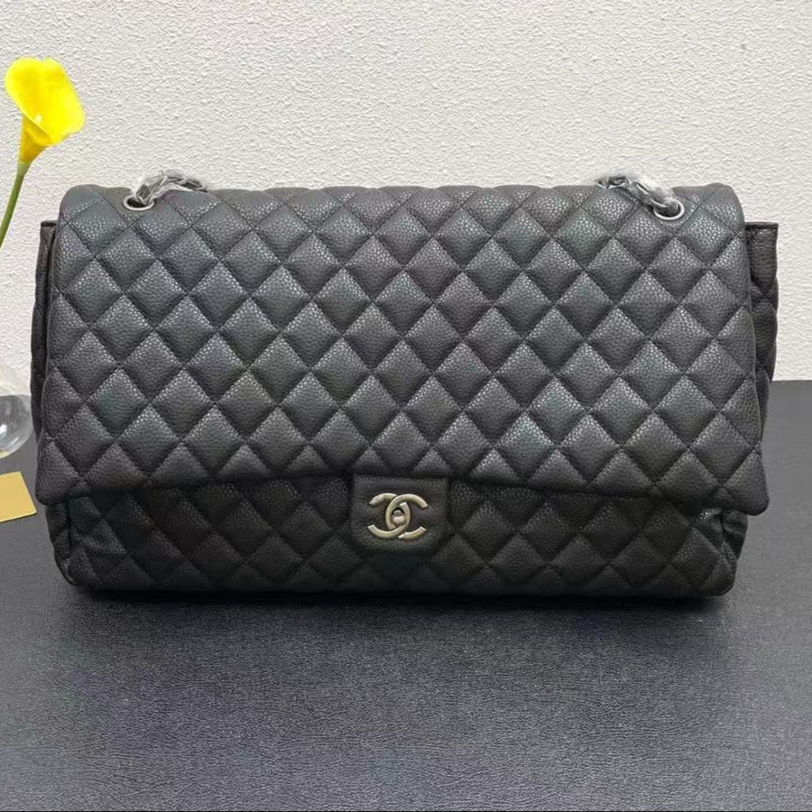Chanel Classic Flap Bag 46 in Black Quilted Calfskin