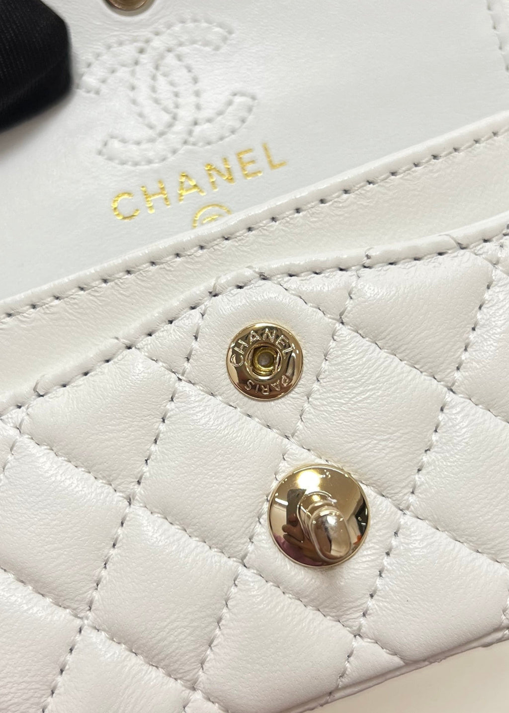 Chanel 25S Flap Charm Bag 13 in White Lambskin