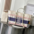 Chanel 25S Shopping Bag 35 in Cream White and Navy Blue Canvas