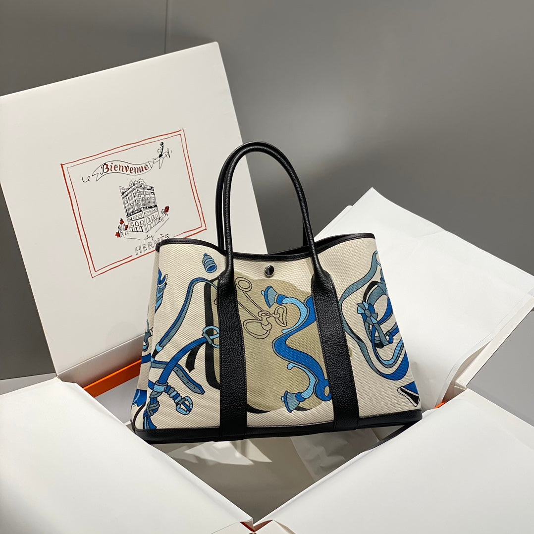 Hermes Garden Party 36 in Blue Ivory Toile H Canvas Black Calfskin Equestrian Harness Print Bag