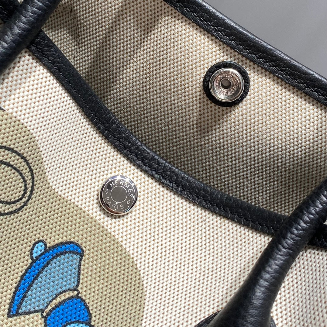 Hermes Garden Party 36 in Blue Ivory Toile H Canvas Black Calfskin Equestrian Harness Print Bag