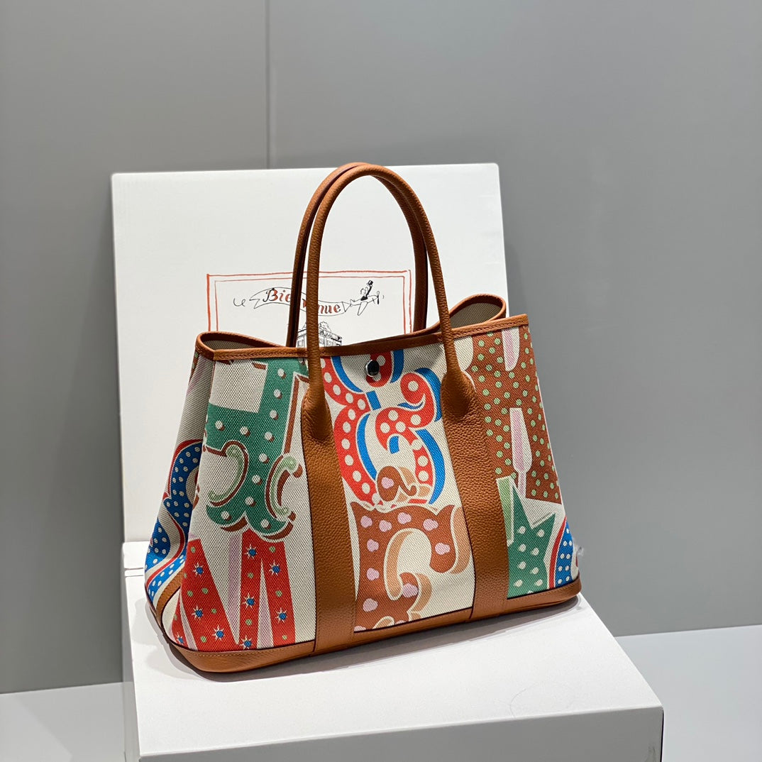 Hermes Garden Party 36 in Multicolor Toile H Canvas Gold Calfskin Circus Typography Print Bag
