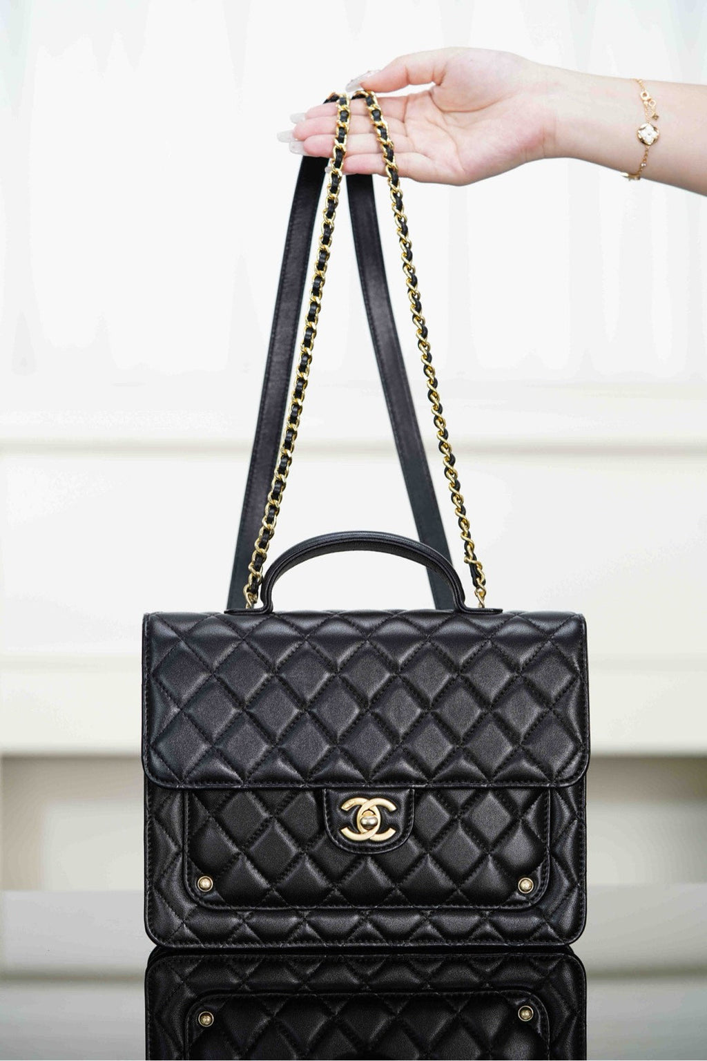 Chanel 25S Top Handle Flap 23 cm in Black Lambskin with Gold Hardware Bag